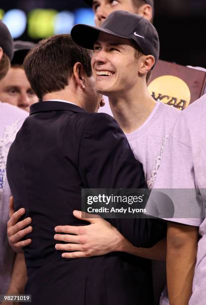 Head coach Mike Krzyzewski and Jon Scheyer of the Duke Blue Devils celebrate after their 61-59 win against the Butler Bulldogs during the 2010 NCAA...