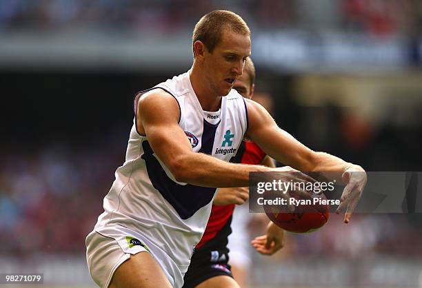 Michael Barlow of the Dockers runs with the ball during the round two AFL match between the Essendon Bombers and the Fremantle Dockers at Etihad...