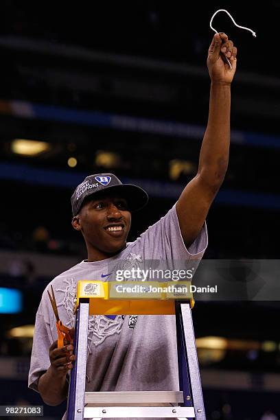 Nolan Smith of the Duke Blue Devils celebrates after he cut down a piece of the net following their 61-59 win against the Butler Bulldogs during the...