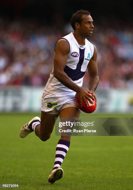 Roger Hayden of the Dockers runs with the ball during the round two AFL match between the Essendon Bombers and the Fremantle Dockers at Etihad...