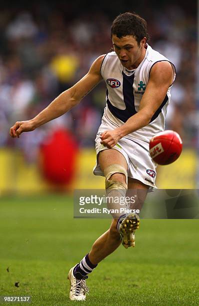 Hayden Ballantyne of the Dockers kicks during the round two AFL match between the Essendon Bombers and the Fremantle Dockers at Etihad Stadium on...