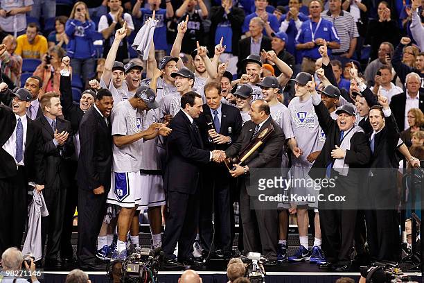 Head coach Mike Krzyzewski and the Duke Blue Devils celebrate after their 61-59 win against the Butler Bulldogs during the 2010 NCAA Division I Men's...