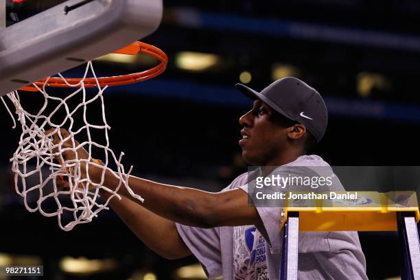 Nolan Smith of the Duke Blue Devils cuts down a piece of the net following their 61-59 win against the Butler Bulldogs during the 2010 NCAA Division...