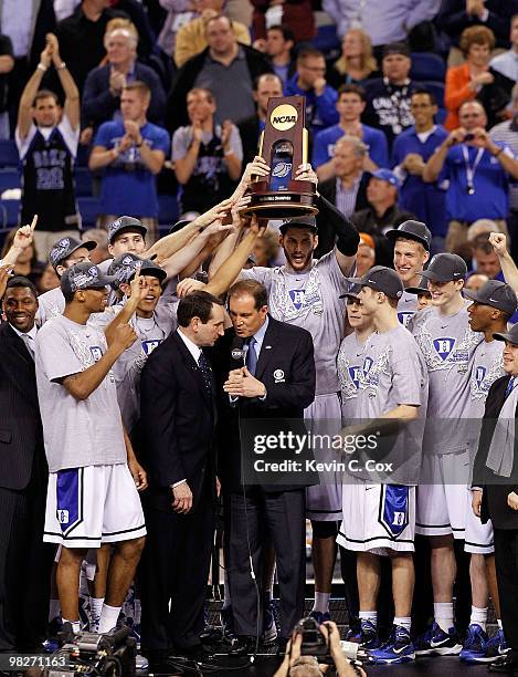 Head coach Mike Krzyzewski and the Duke Blue Devils celebrate after their 61-59 win against the Butler Bulldogs during the 2010 NCAA Division I Men's...