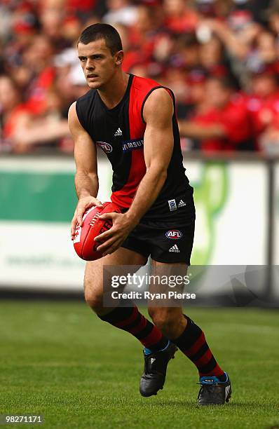 Brent Stanton of the Bombers kicks during the round two AFL match between the Essendon Bombers and the Fremantle Dockers at Etihad Stadium on April...