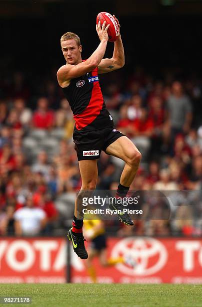 Jason Winderlich of the Bombers marks during the round two AFL match between the Essendon Bombers and the Fremantle Dockers at Etihad Stadium on...