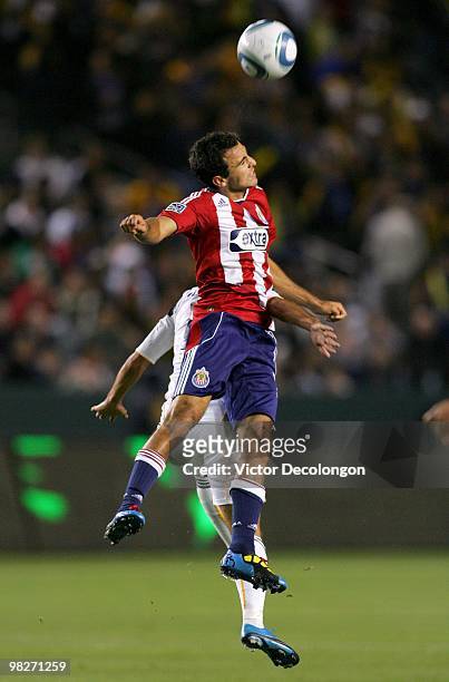 Jonathan Bornstein of Chivas USA goes up for a high ball against the Los Angeles Galaxy during their MLS match at the Home Depot Center on April 1,...