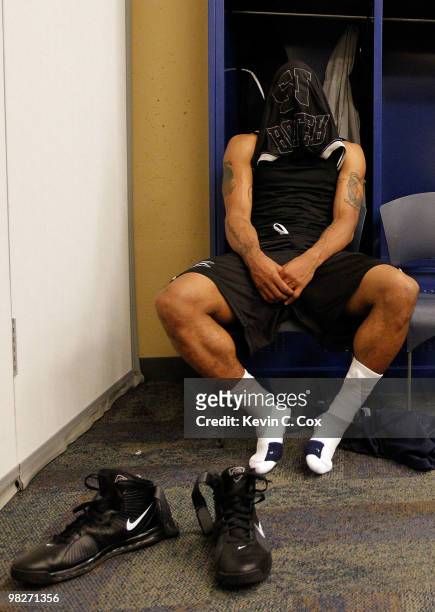 Willie Veasley of the Butler Bulldogs sits in the locker room after losing to the Duke Blue Devils 61-59 in the 2010 NCAA Division I Men's Basketball...