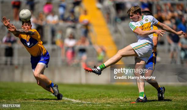 Offaly , Ireland - 24 June 2018; Johnny Moloney of Offaly in action against Aaron Fitzgerald of Clare during the GAA Football All-Ireland Senior...