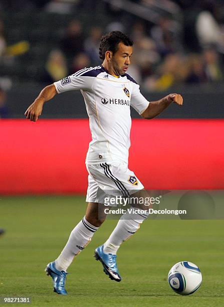 Juninho of the Los Angeles Galaxy plays the ball across the field during their MLS match against Chivas USA at the Home Depot Center on April 1, 2010...
