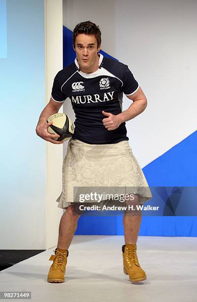 Rugby player Thom Evans walks the runway at the 8th annual "Dressed To Kilt" Charity Fashion Show presented by Glenfiddich at M2 Ultra Lounge on...