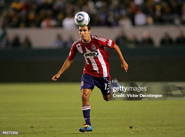 Jonathan Bornstein of Chivas USA looks to his goalkeeper to play the ball in the first half during their MLS match against the Los Angeles Galaxy at...