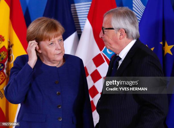 German Chancellor Angela Merkel is welcomed by European Commission President Jean-Claude Juncker ahead of an informal EU summit on migration at the...