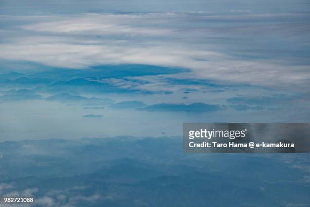 seto inland sea and imabari city in ehime prefecture daytime aerial view from airplane - imabari city stock pictures, royalty-free photos & images