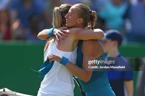 Petra Kvitova of the Czech Republic embraces Magdalena Rybarikova of Slovakia at the net after her victory in her singles Final match against...