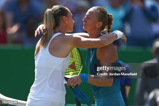 Petra Kvitova of the Czech Republic embraces Magdalena Rybarikova of Slovakia at the net after her victory in her singles Final match against...