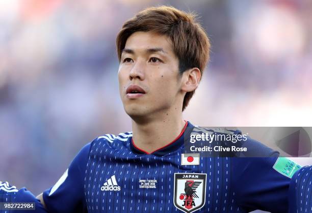 Yuya Osako of Japan sings the national anthem prior to the 2018 FIFA World Cup Russia group H match between Japan and Senegal at Ekaterinburg Arena...