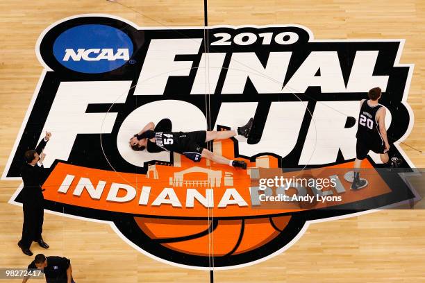 Matt Howard and Gordon Hayward of the Butler Bulldogs remain on the court dejected after they lost 61-59 against the Duke Blue Devils during the 2010...