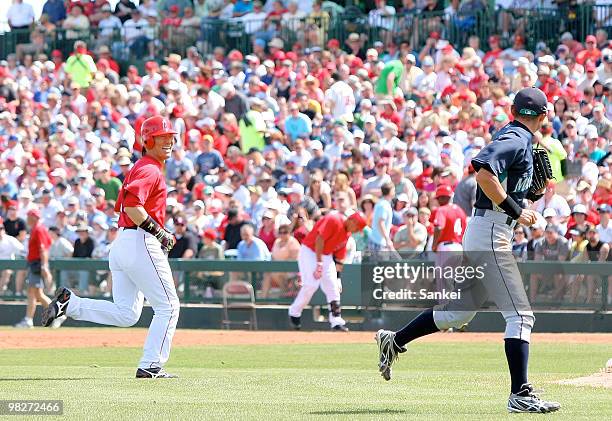 Hideki Matsui of Los Angeles Angels of Anaheim and Ichiro Suzuki of Seattle Mariners chat during a Spring Camp game between Seattle Mariners and Los...