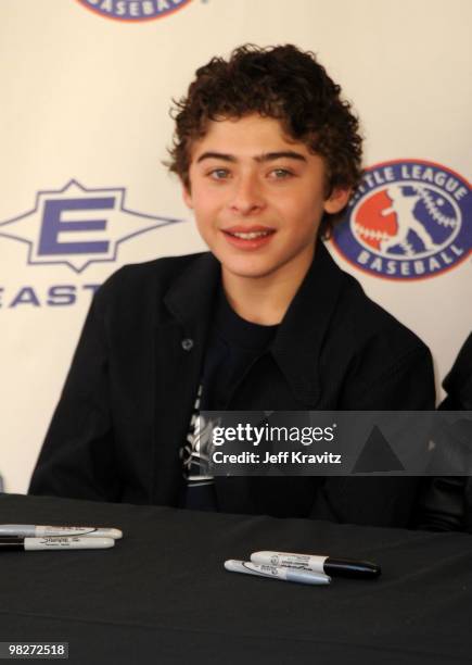 Actor Ryan Ochoa signs autographs during the Los Angeles premiere of "The Perfect Game" pre-event in the Pacific Theaters at the Grove on April 5,...