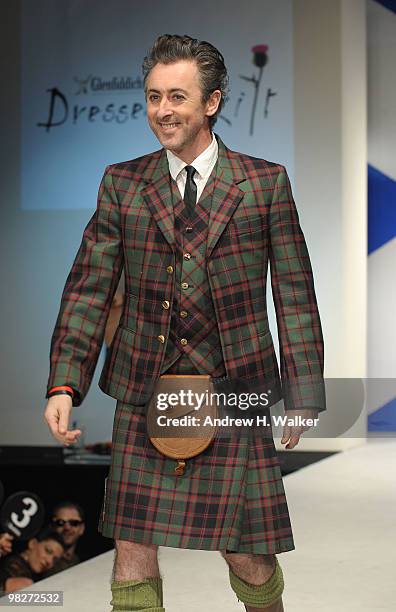 Actor Alan Cumming walks the runway at the 8th annual "Dressed To Kilt" Charity Fashion Show presented by Glenfiddich at M2 Ultra Lounge on April 5,...