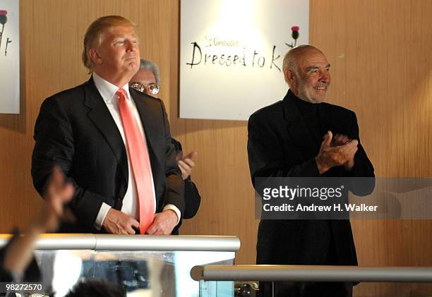 Donald Trump and Sir Sean Connery look on as models walk the runway at the 8th annual "Dressed To Kilt" Charity Fashion Show presented by Glenfiddich...