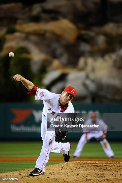 Pitcher Jered Weaver of the Los Angeles Angels of Anaheim throws a pitch against the Minnesota Twins in their Opening Day game at Angel Stadium on...