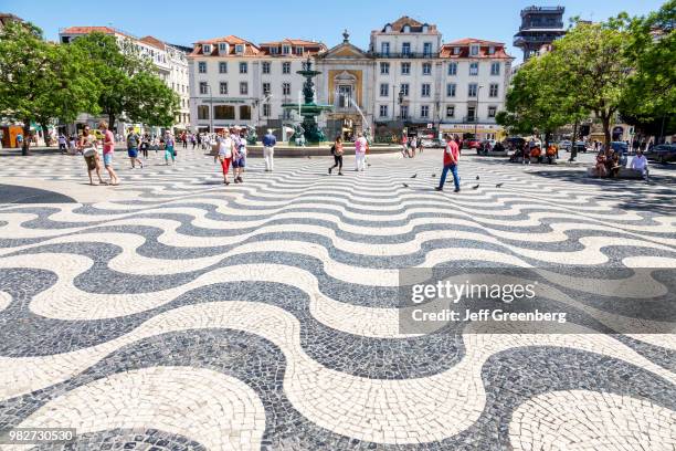 Portugal, Lisbon, Rossio Square, traditional-style mosaic pavement.