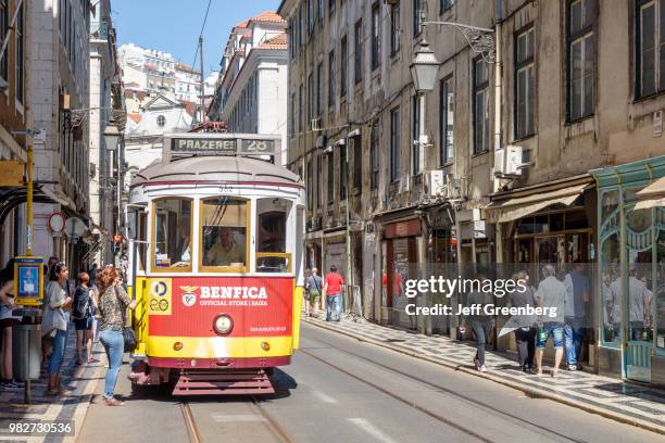 Portugal, Lisbon, Baixa, Chiado, Rua da Conceicao, trolley picking up passengers.