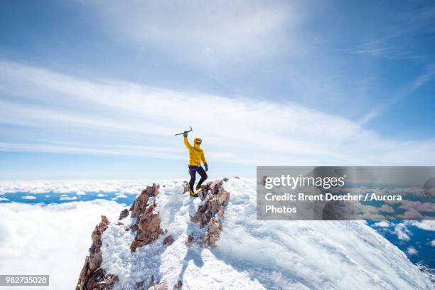 mountain climber at summit of mt shasta, california, usa - mountain top stock pictures, royalty-free photos & images