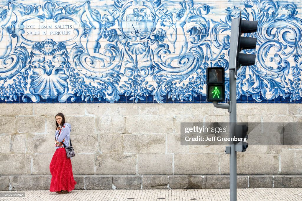 Portugal, Porto, historic district, Igreja do Carmo, church exterior mosaic wall with woman