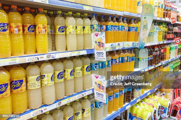 Bottles of fruit flavored mineral water for sale in Supermercados Coto.