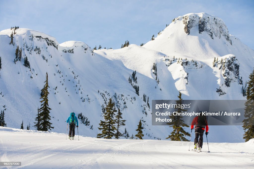 Two men cross-country skiing in North Cascades National Park, Washington State, USA