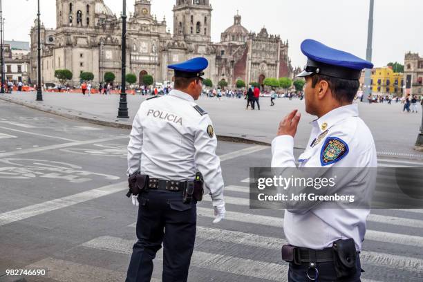 Mexico City, Policemen at street crossing.