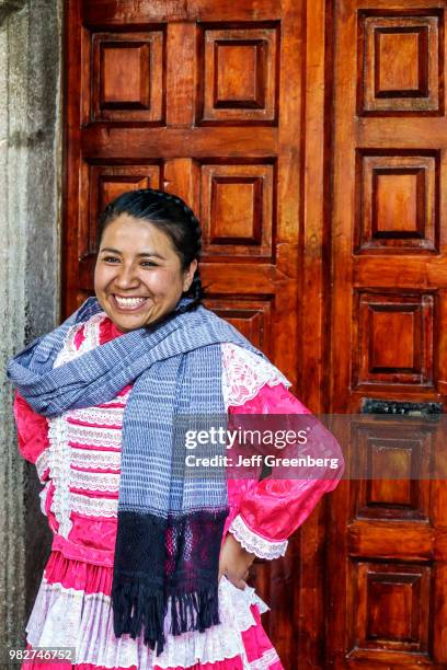 Mexico City, Saint John the Baptist Catholic Church, woman in traditional dress.