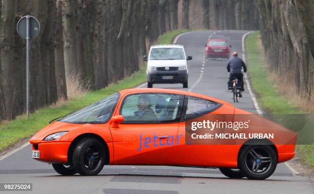 Christian Wenger-Rosenau, developer and chief constructor of the electric powered car "Jetcar", drives the car along a road near in the eastern...