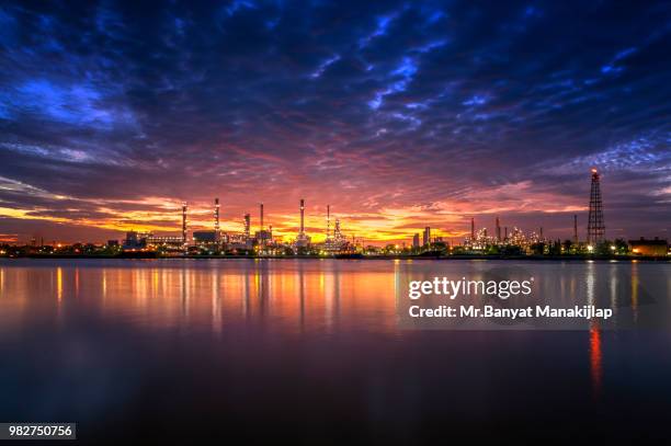 early morning oil refinery industry reflection. oil refinery on beautiful sky. oil refinery produces gasoline. - gas plant stock pictures, royalty-free photos & images