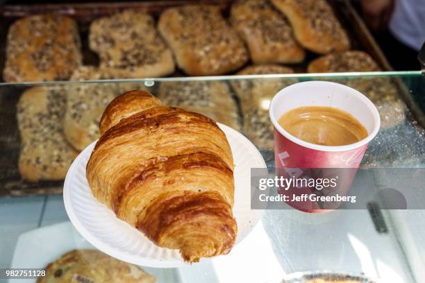 Mexico City, Panaderia Lecaroz, croissant and espresso coffee in bakery.