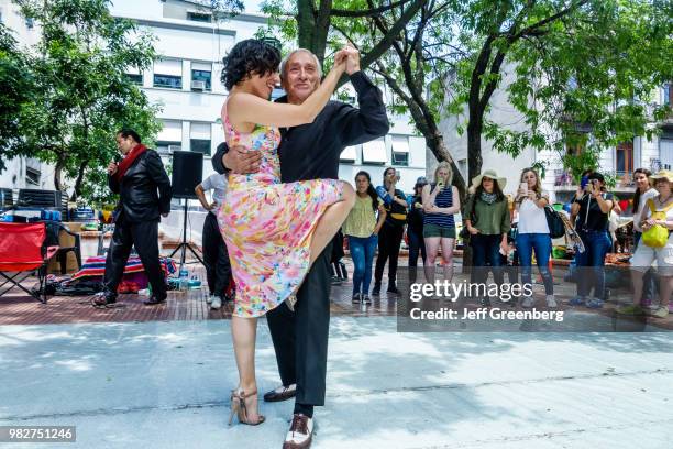 Tango dancers performing at San Telmo Plaza Dorrego.