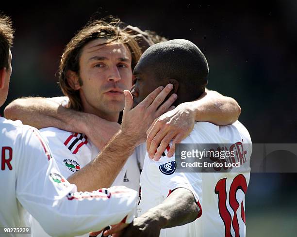 Seedorf and Andrea Pirlo of Milan during the Serie A match between Cagliari Calcio and AC Milan at Stadio Sant'Elia on April 3, 2010 in Cagliari,...
