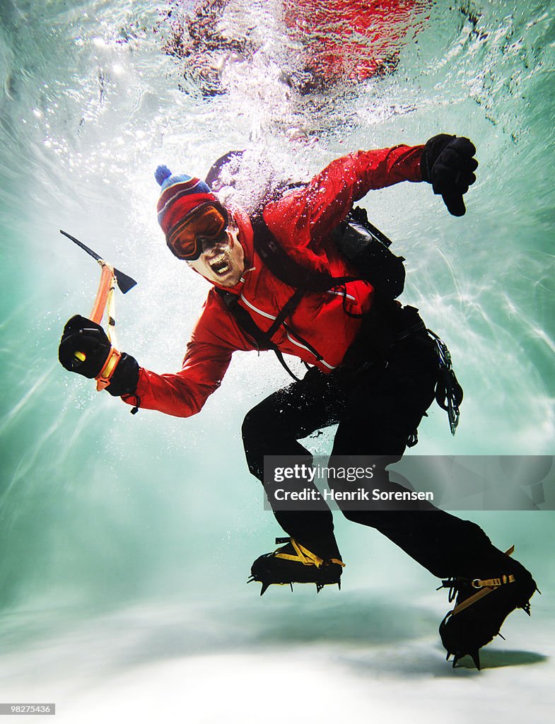 Mountain climber underwater