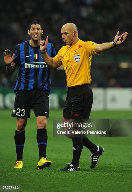 Marco Materazzi of FC Internazionale Milano reacts with Referee Howard Webb of Great Britain during the UEFA Champions League Quarter Finals, First...