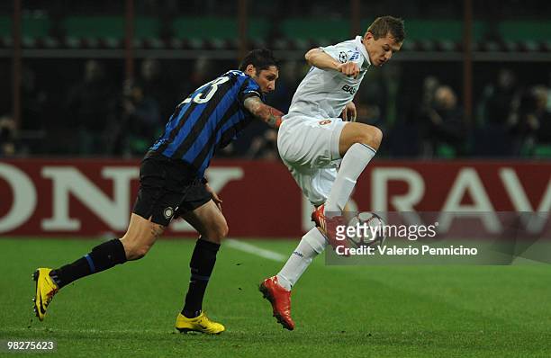 Marco Materazzi of FC Internazionale Milano battles for the ball with Tomas Necid of CSKA Moscow during the UEFA Champions League Quarter Finals,...