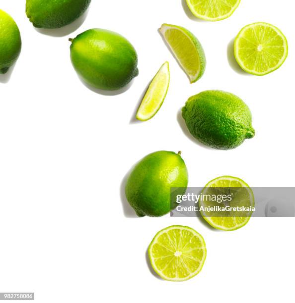 fresh limes on a white background - lime bildbanksfoton och bilder