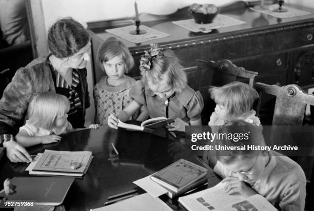 Children Being Home Schooled, Westmoreland Homesteads, Mount Pleasant, Pennsylvania, USA, Carl Mydans, U.S. Resettlement Administration, February...