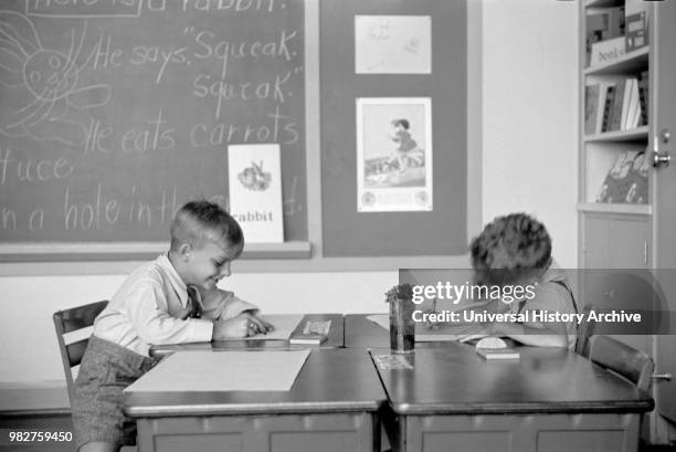 Two Young Boys Drawing at Desks in Classroom, Greenhills, Ohio, USA, a Greenbelt Community Constructed by U.S. Department of Agriculture as Part of...