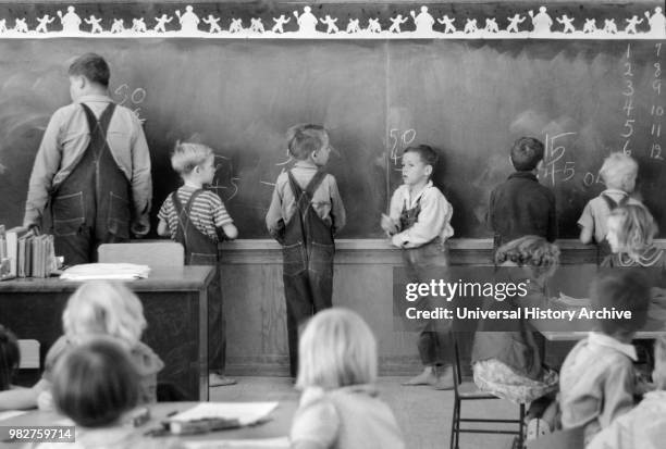 Children of Migratory Workers in Elementary School Classroom at FSA Camp, Weslaco, Texas, USA, Arthur Rothstein for Farm Security Administration,...