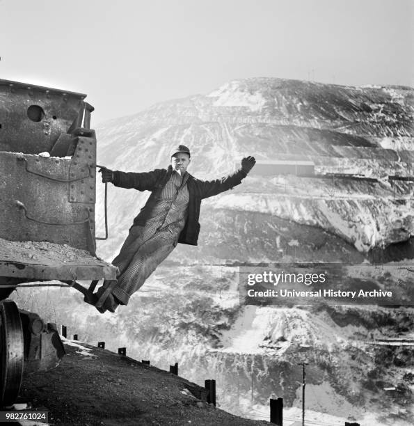 Brakeman of an Ore Train at Open-Pit Mining Operations, Utah Copper Company, Bingham Canyon, Utah, USA, Andreas Feininger for Office of War...