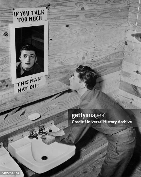 Soldier Looking in Bathroom Mirror with a Reminder to Practice Discretion, "If You Talk Too Much This Man May Die", Camp Hood, Texas, USA, Office of...