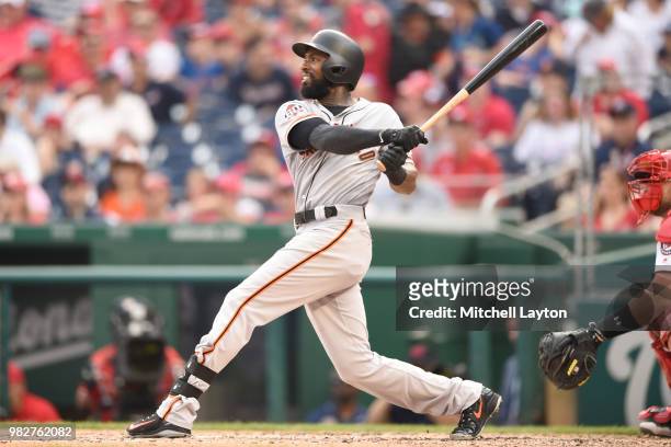 Austin Jackson of the San Francisco Giants takes a swing during a baseball game against the Washington Nationals at Nationals Park on June 9, 2018 in...